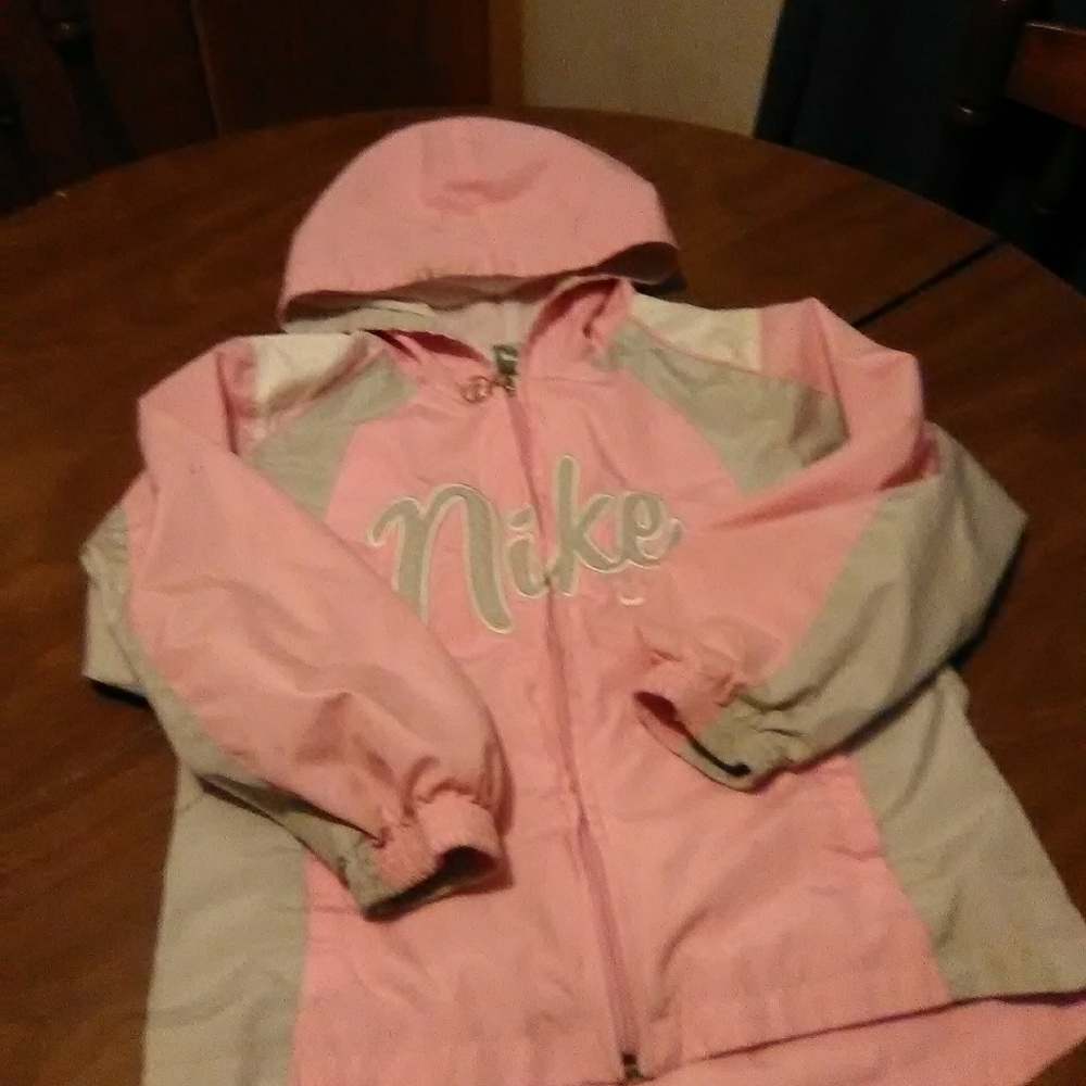 Nike size 6 rain jacket with hood